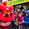 Photos: Manhattan's Chinatown Covered In Confetti For Year Of The Rooster Parade   